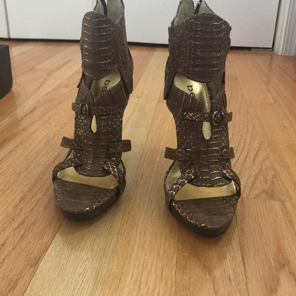 pair of women's brown Bebe platform high heels